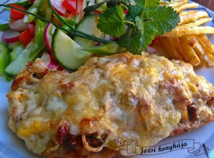 Karajszeletek ínyenc raguval sütve